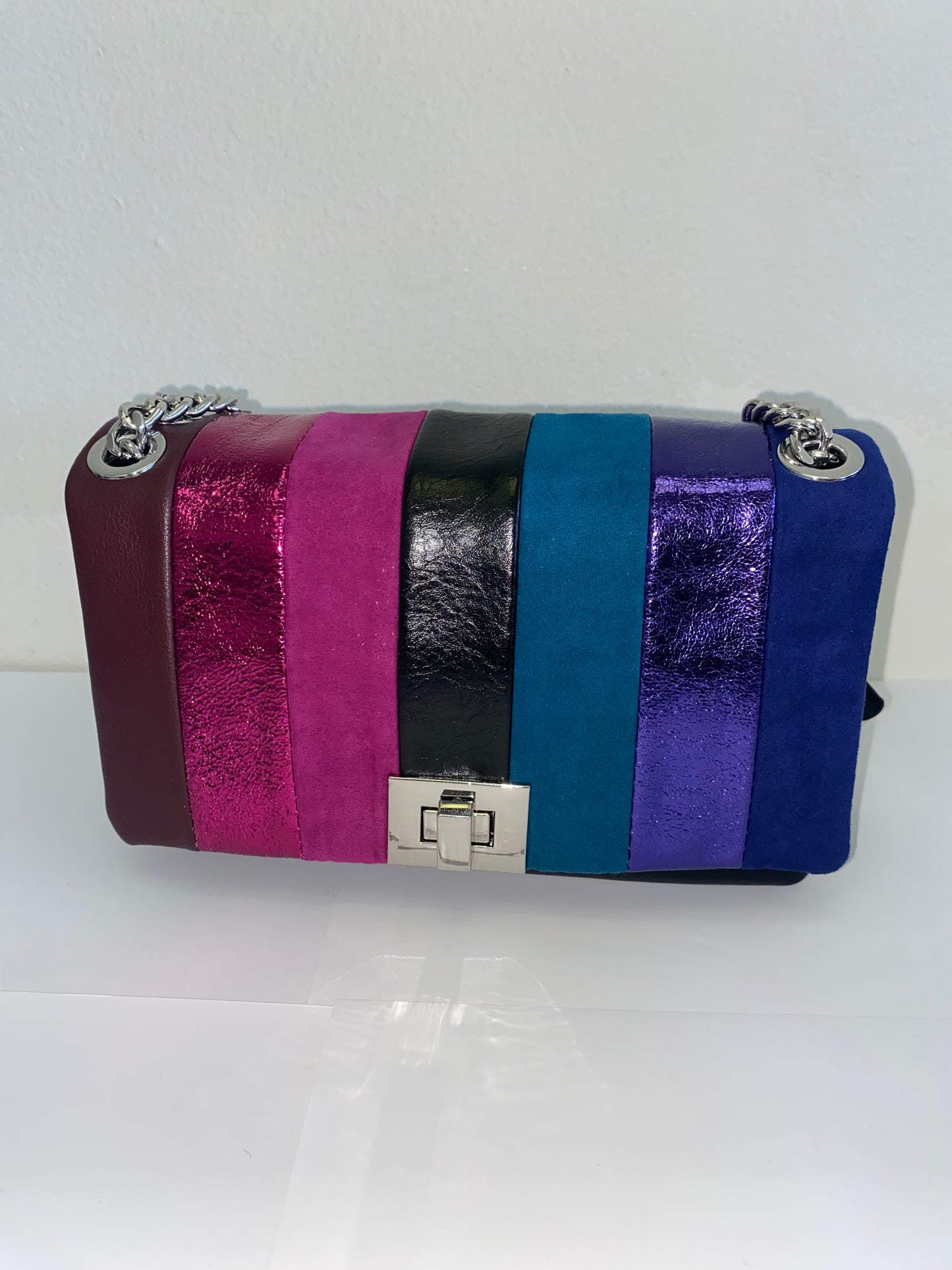 This is an I.N.C. International Concepts Soft Ajae Patchwork Crossbody bag