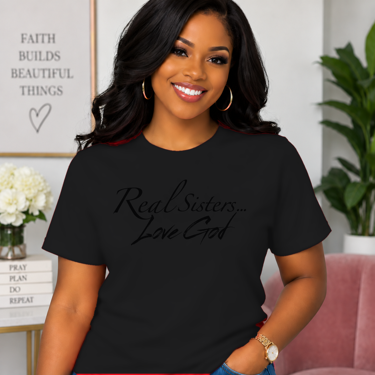 Model wearing Black Real Sisters Love God T-shirt with Black lettering, crisp original logo