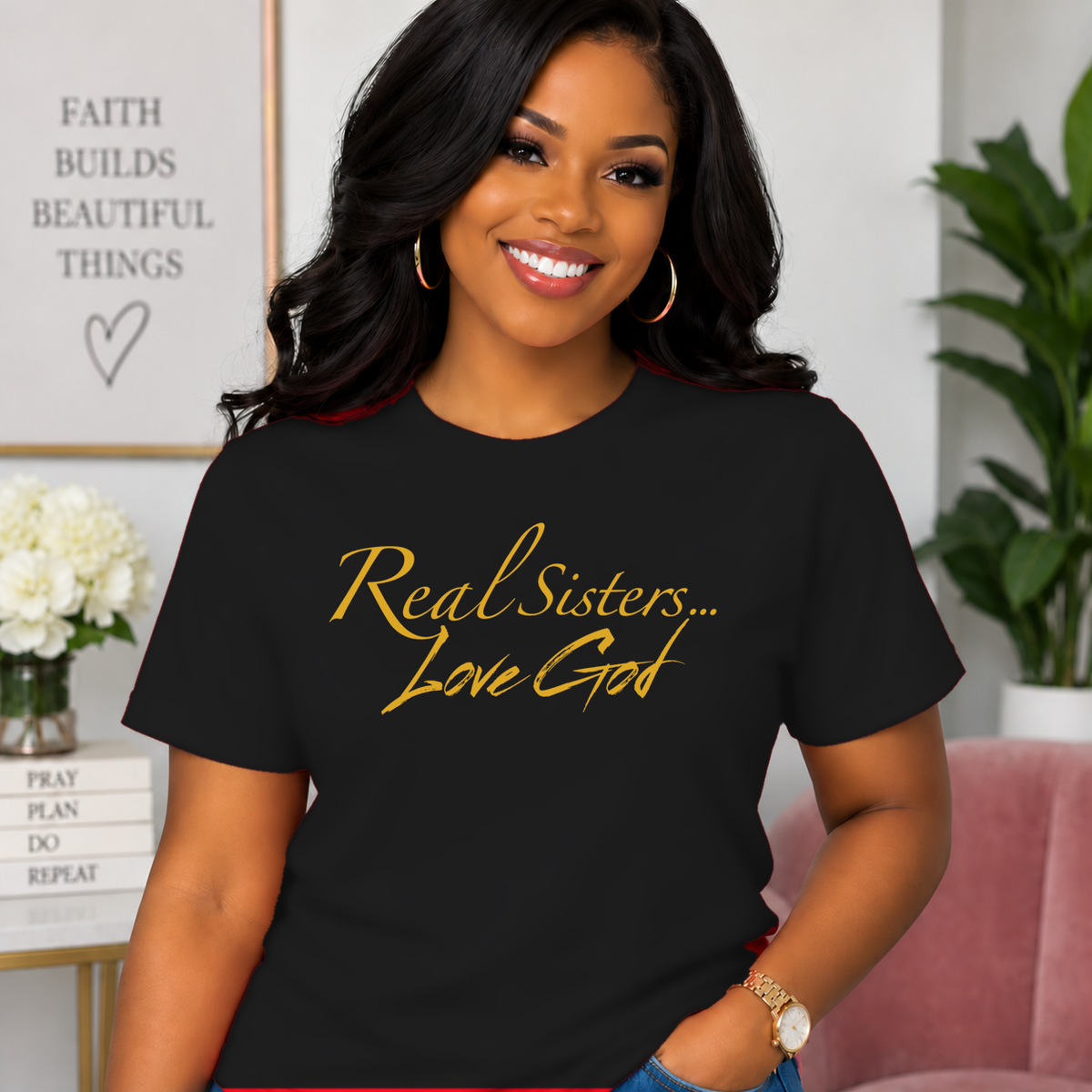 Model wearing Black Real Sisters Love God T-shirt with Gold lettering, crisp original logo