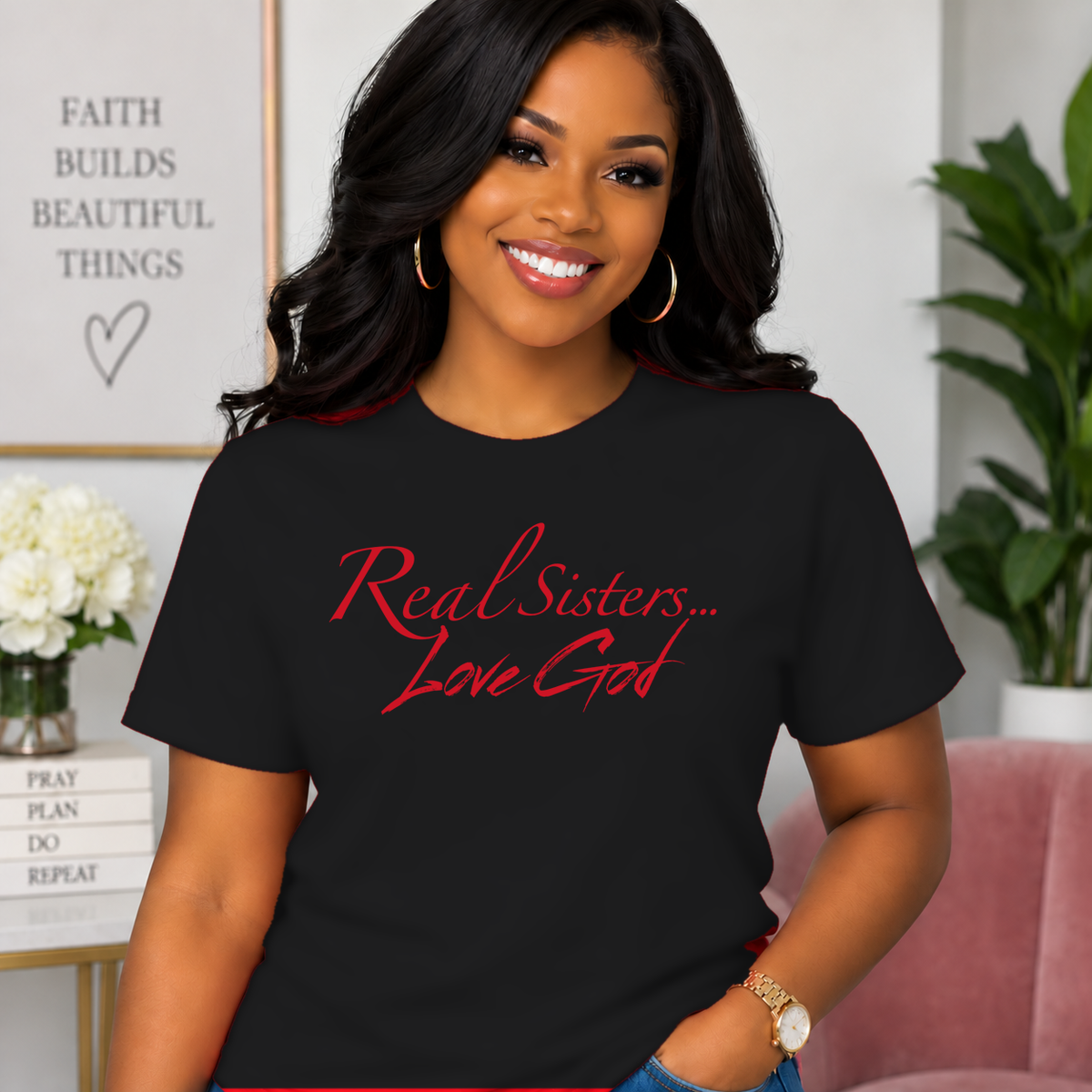 Model wearing Black Real Sisters Love God T-shirt with Red lettering, crisp original logo