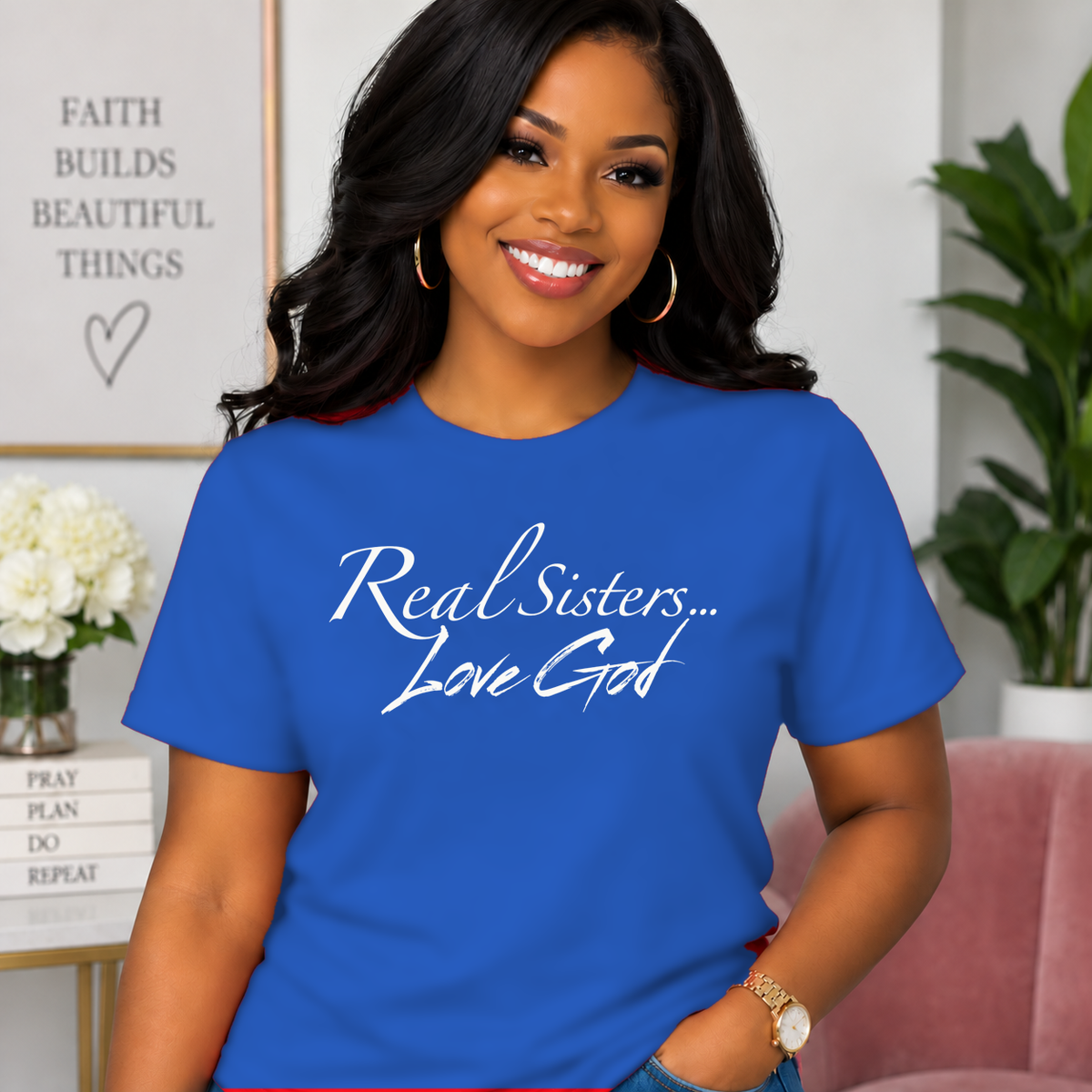 Model wearing Blue Real Sisters Love God T-shirt with White lettering, crisp original logo