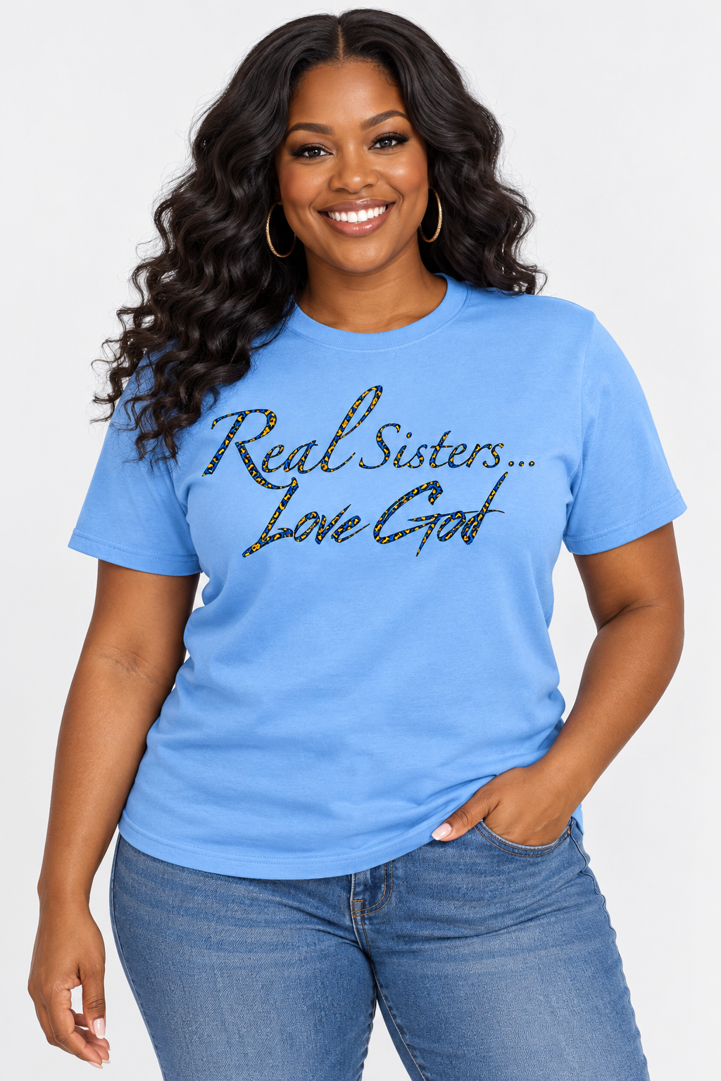 Model wearing Carolina Blue Real Sisters Love God T-shirt with Southern blue and gold jaguar print