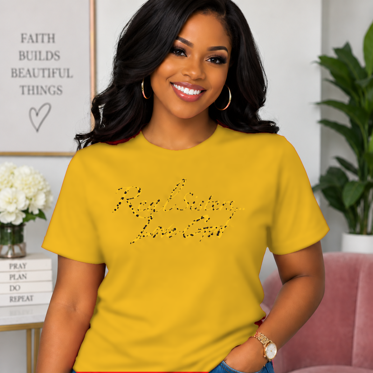 Model wearing Gold Real Sisters Love God T-shirt with Jag Print lettering, crisp original logo