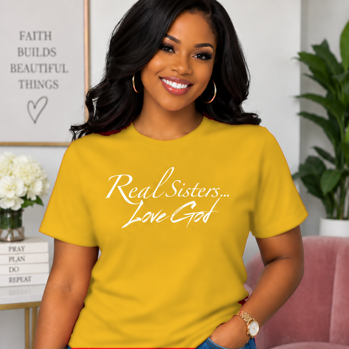 Model wearing Gold Real Sisters Love God T-shirt with White lettering, crisp original logo