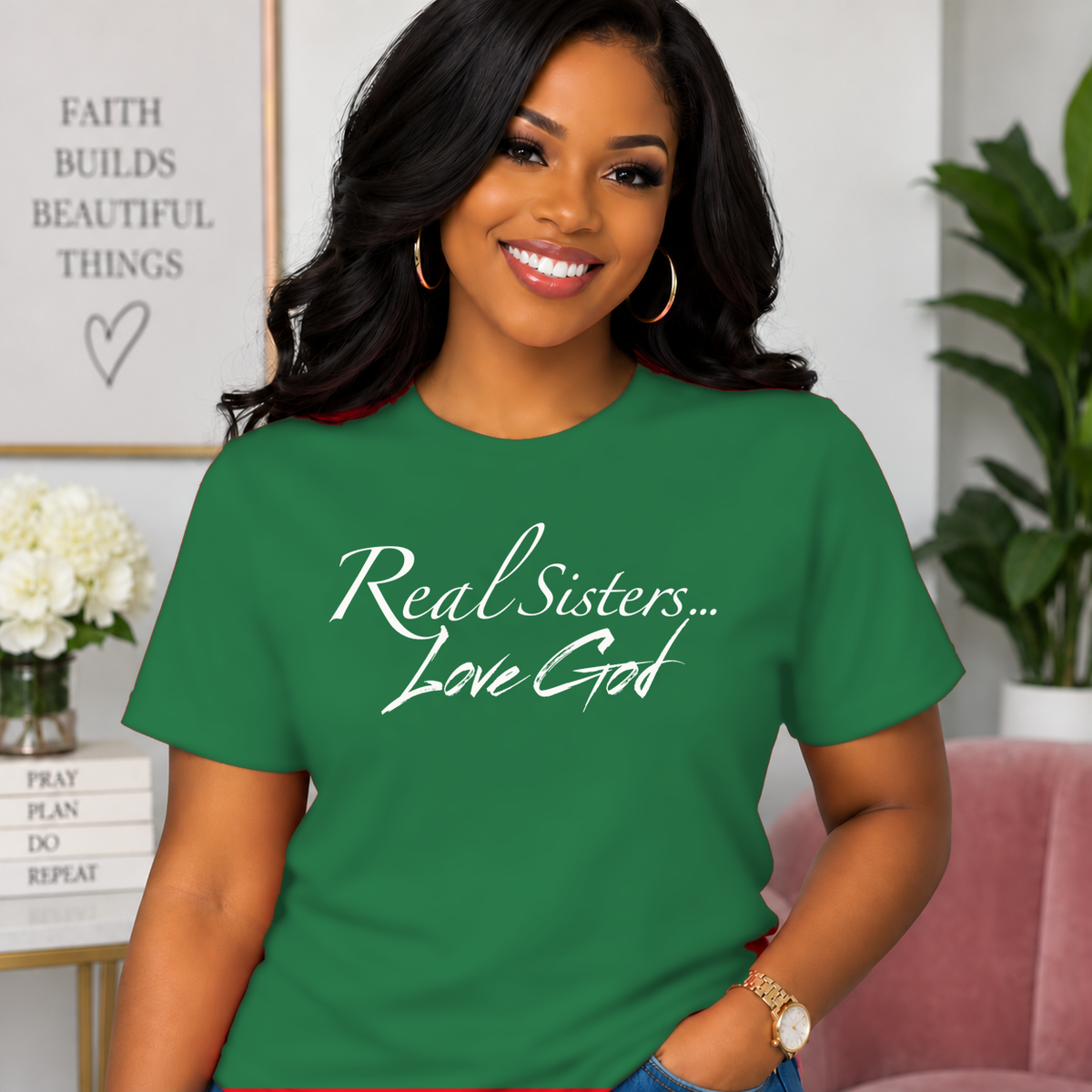 Model wearing Green Real Sisters Love God T-shirt with White lettering, crisp original logo