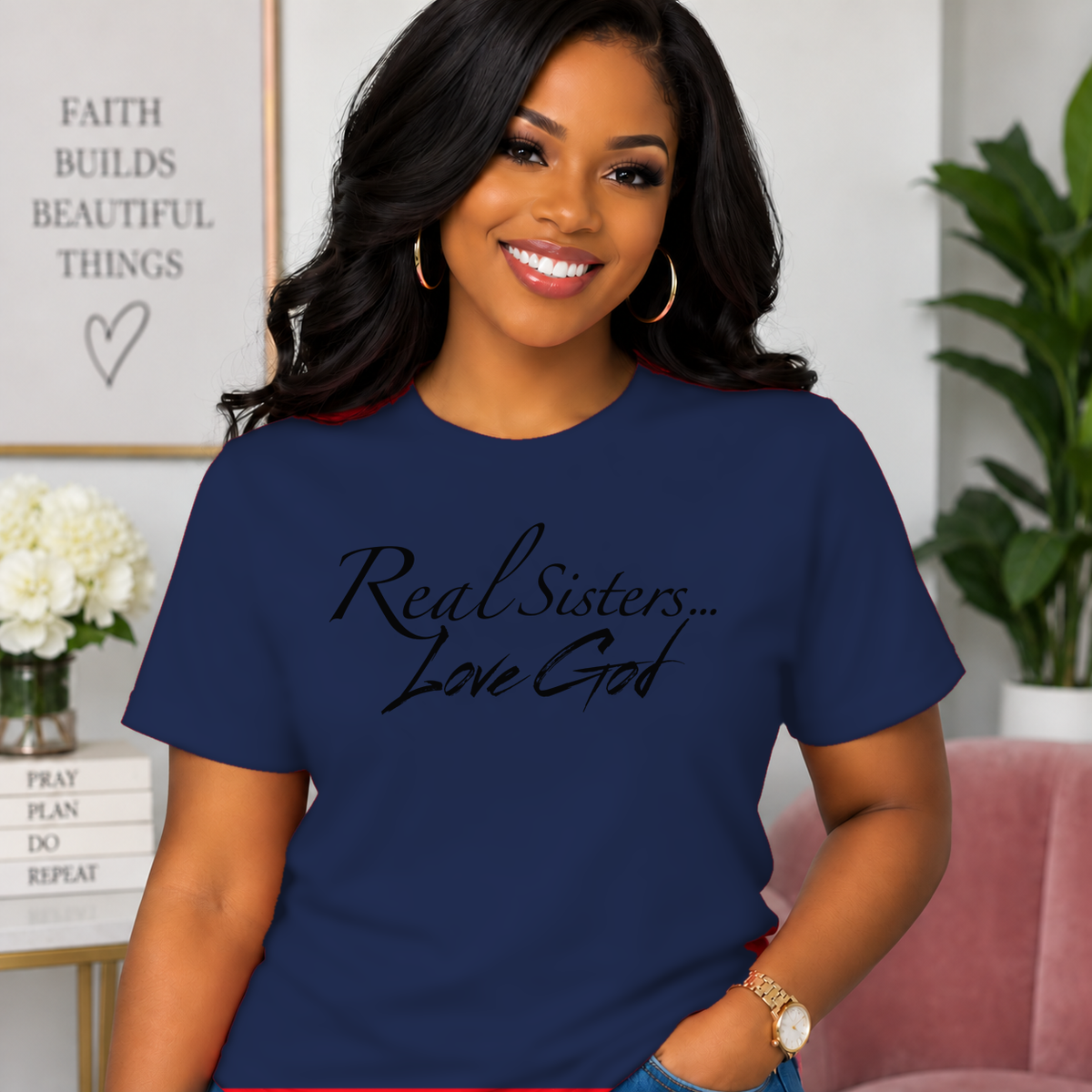 Model wearing Navy Real Sisters Love God T-shirt with Black lettering, crisp original logo