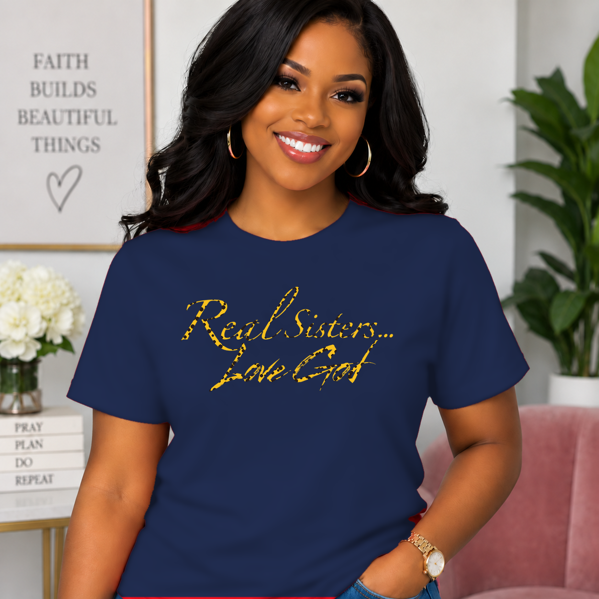Model wearing Navy Real Sisters Love God T-shirt with Jag Print lettering, crisp original logo