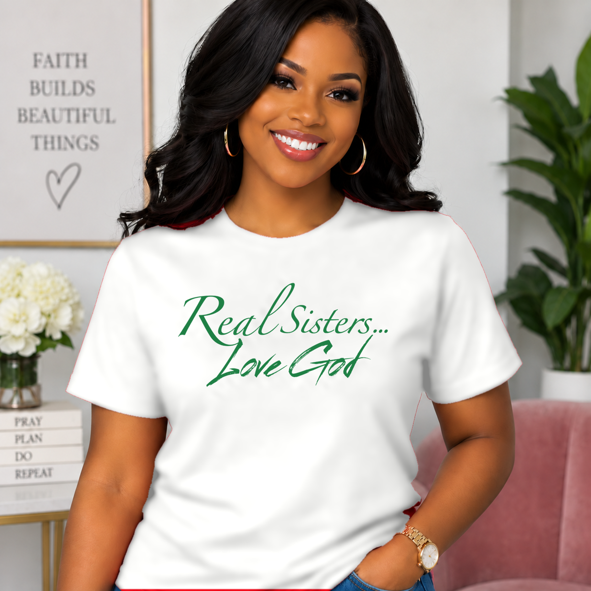 Model wearing White Real Sisters Love God T-shirt with Green lettering, crisp original logo