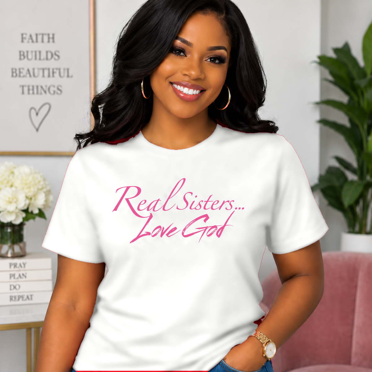 Model wearing White Real Sisters Love God T-shirt with Pink lettering, crisp original logo